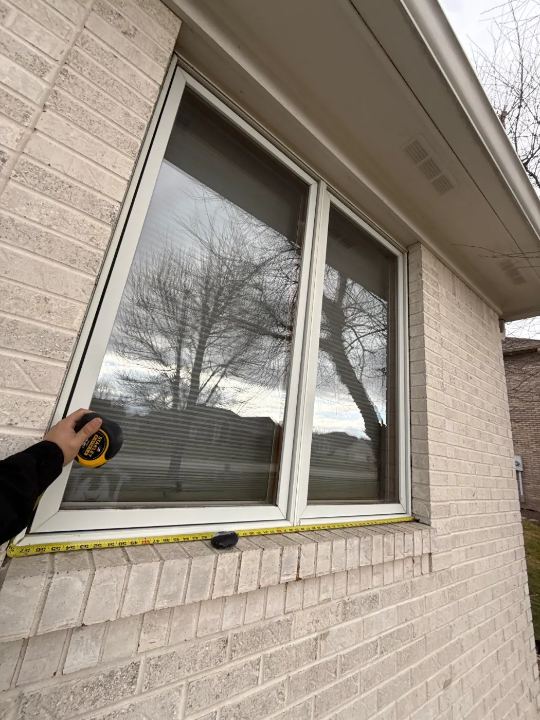 Frame and seal detail on a Greentown window job